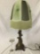 Modern art deco inspired cast figural base table lamp with ornate shade