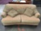 Vintage Alan White duck down couch with light pink/cream upholstery and pillows