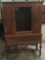 Antique deco curio cabinet w/ drawer - missing shelves - nice wood grain and detail