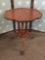 Antique mahogany deco pie-crust side table with 3 column base