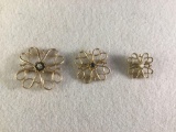 3 matching 10K gold brooches w/ center cut gemstones @ 6.2 grams total weight