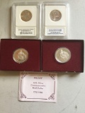2 sealed .999 silver Sacajawea dollars and 2 90% silver Washington half dollars