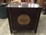 Modern Asian influenced mahogany cabinet with brass detail
