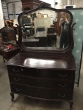 Antique curved front 3 drawer vanity dresser with large mirror, original handles and mahogany stain