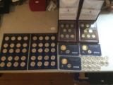 75 uncirculated U. S. 1 dollar presidential coins and 3 ten dollar presidential coins in proof sets