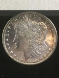 MS quality 1882-S silver Morgan dollar w/ doubling in the date and nice toning around edge