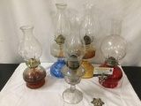 Lot of 5 antique oil lamps with chimneys - 4 w/ colored bases - no oil included