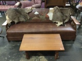 Vintage Wagon Wheel Style Couch with Leather Cushion with wildlife mountain scene design