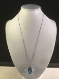 18 inch 10K white gold necklace w/ a 20ct blue topaz on 14K white gold pendant