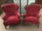 Pair of antique cushioned Victorian armchairs with detailed mahogany frame and tufted back as is
