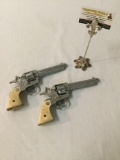 Pair of Nichols Stallion 38 toy cap guns aporox 10 x 5 inches