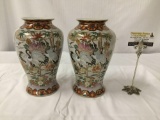 Pair of matching Asian style vases with bird design, approx 11x6 inches