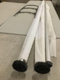 Lot of 3 long sewing rods and metal rack, approx 107 x 4 inches.