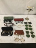 Lot of vintage eye glasses, sun glasses and Ray Ban sunglasses plus attachments