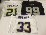 3 Football Jerseys, M-XL. Tomlinson 21, Sapp 99, and Huskies 33