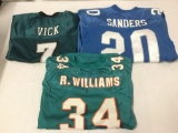 3 NFL Jerseys, XL-XXL. Vick 7, Sanders 20, R Williams 34