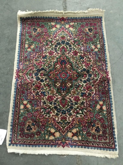 Handmade vibrant jewel tone wool carpet with classic Persian Kirman style