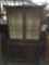 Asian inspired vintage locking china cabinet w/ glass shelves, glass doors, and lower cabinet,
