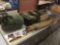 Huge lot of vintage US army gear incl cot ballistics trajectory chart, suits, sleeping bag and more