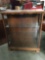 Vintage wooden display case w/ 3 shelves and glass doors - shows wear and scratches