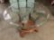 Modern wood and metal base dining table with etched flower scene glass top