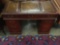 40's mahogany leather top writing desk with 9 drawers - some wear