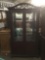 vintage detailed wooden china cabinet w/ glass doors and 2 glass shelves