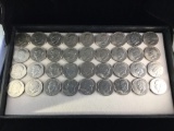 Collection of 36 uncirculated quality Eisenhower dollars from 1971 to 1978