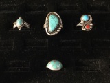 Set of 4 sterling silver and turquoise rings, 1 with a little coral