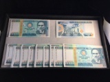 Bundle of 100 Peruvian 10,000 Uncirculated bank notes in sequential order from 1988