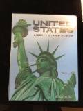 United States Liberty Stamp Album Volume 1 of 4 almost completely filled w/ U. S. Stamps