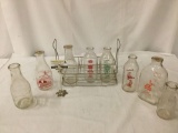 8 pc lot of vintage milk bottles with wire carrier - Arden, Lucky's, Carnation, Greenfield etc see