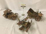 Selection of 3 vintage copper/tin wind up music box vehicles incl. 2 cars and 1 plane