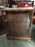 Vintage wooden display case w/ 3 shelves and glass doors - shows wear and scratches