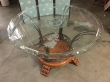 Modern wood and metal base dining table with etched flower scene glass top