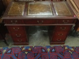 40's mahogany leather top writing desk with 9 drawers - some wear
