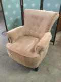 Mid century modern cushioned armchair with pleated back