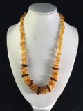 Attractive natural Baltic Amber necklace of various colors and graduated sizes