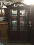 vintage detailed wooden china cabinet w/ glass doors and 2 glass shelves