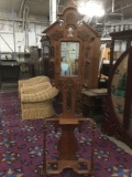 Antique Mahogany hall tree w/ steeple top, beautiful detailing, and a mirrored back