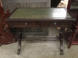 Antique leather top writing desk w/ 2 drawers and claw foot design