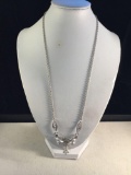 Finely designed and attractive sterling silver designer necklace, signed