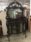 Antique 2 pc Mahogany china/display cabinet with mirror back and rounded glass doors - as is