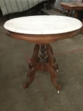 Antique wood round kitchen table w/ marble top and casters