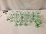 Lot of 24 green depression era glasses and goblets - 15 pieces are Vaseline glass