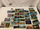 Lot of over 60 vintage travel postcards, some are postmarked, others are not; many Washington