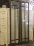 Pair of antique mahogany stain French doors with paned glass panels