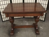 Antique wooden oak desk/small table with drop leaf top and trestle base - good cond