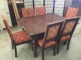 Antique oak dining table with cared legs and 6 matching cushioned chairs - chairs as is