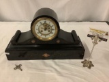 Antique French R. Marti mantle clock with skeleton face, carved stone base and brass detail